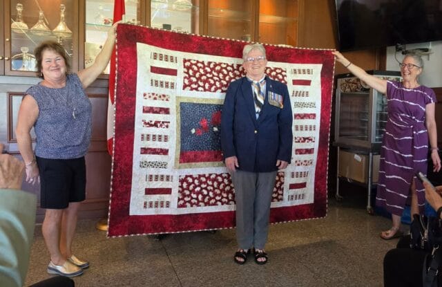Comrade France Bergeron was honoured with a Quilts of Valour Canada presentation on May 20, 2026, at the Royal Canadian Legion Orleans Branch, in recognition of her outstanding military service.Surrounded by many friends and fellow comrades, France celebrated this well-deserved honour alongside those who deeply appreciate her dedication and sacrifice.Her distinguished military career spanned 33 years, including 23 years in the Regular Force and 10 years in the Reserves. During her service, she deployed on five missions: the Gulf War, Bosnia, Haiti, Eritrea, and Afghanistan.Thank you, France, for your unwavering dedication, sacrifice, and many years of proud service to Canada._____________________________________________La camarade France Bergeron a été honorée par une présentation de Quilts of Valour Canada le 20 mai 2026 à la filiale d’Orléans de la Légion royale canadienne, en reconnaissance de son service militaire exceptionnel.Entourée de nombreux amis et camarades, France a célébré cet honneur bien mérité aux côtés de ceux et celles qui apprécient profondément son dévouement et ses sacrifices.Sa brillante carrière militaire s’est échelonnée sur 33 ans, dont 23 ans dans la Force régulière et 10 ans dans la réserve. Au cours de son service, elle a participé à cinq déploiements : la guerre du Golfe, la Bosnie, Haïti, l’Érythrée et l’Afghanistan.Merci, France, pour ton dévouement indéfectible, tes sacrifices et tes nombreuses années de service fier et loyal au Canada.